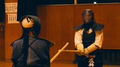 Slow Motion, Two Kendo Students with Bamboo Swords Fight Each Other, Japan 4K Vidéo 131024388
