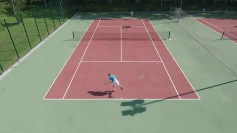 Slow motion. Two men playing tennis. Stock Footage 252847602
