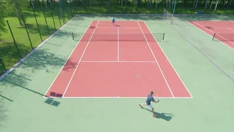 Slow motion. Two men playing tennis. Stock Footage 252847606