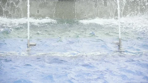 Slow motion two nozzles with jets of water in a fountain Stock Footage 88664717