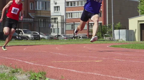 SLOW MOTION: Two young men running Stock Footage 64523643