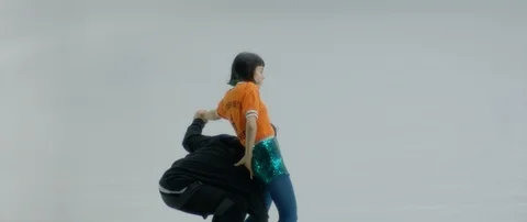 Slow motion of two young people having fun together and laughing in a studio Stock Footage 126536273