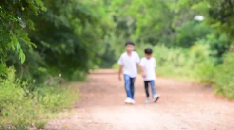 Slow motion Two young Thai boy run Stock Footage 68829073