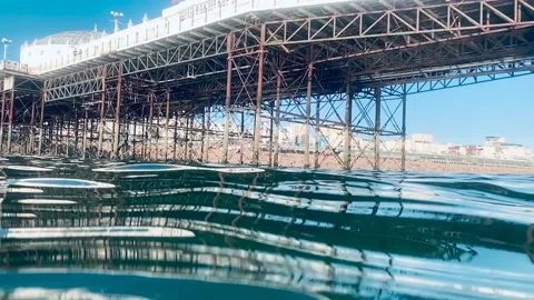 Slow motion underneath brighton pier Stock Footage 139273917