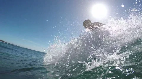 SLOW MOTION UNDERWATER: Pro surfer catching big wave Stock Footage 52213388