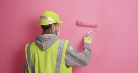 Slow motion. Unrecognizable redhead man in protective helmet respirator and Stock Footage 155860478