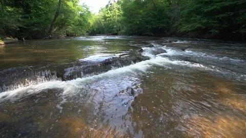 Slow motion upstream river view Stock Footage 112146358