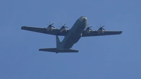 Slow-motion: US Air Force (USAF) military aircraft flying in blue sky, jet 库存影片 100708257