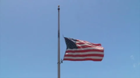 Slow Motion US American Flag at Half Mast 60p to 30p 15sec Stock Footage 7752844