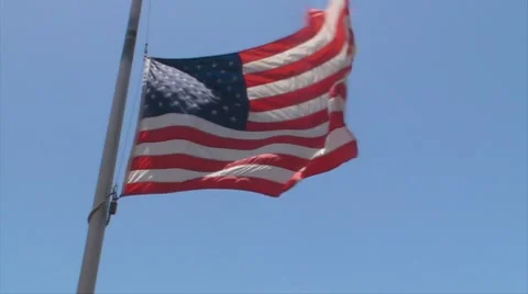 Slow Motion USA American Flag at half mast 60p to 30p Stock Footage