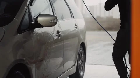 Slow motion of using water under high pressure to clean a car Video stock 144674532