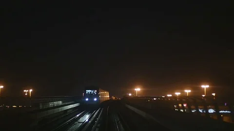 Slow motion variation of Dubai Metro's POV through the city nightscape. P3 Video stock 83671343