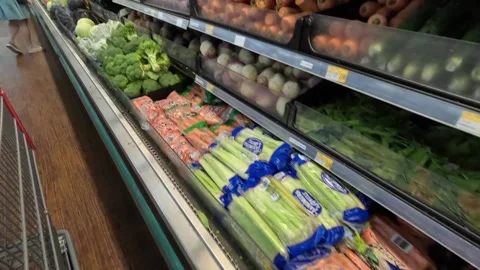 Slow motion vegetable supermarket display Stock Footage 224815616