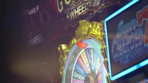 Slow motion vertical pan close-up gold roulette wheel Stock Footage 335699989