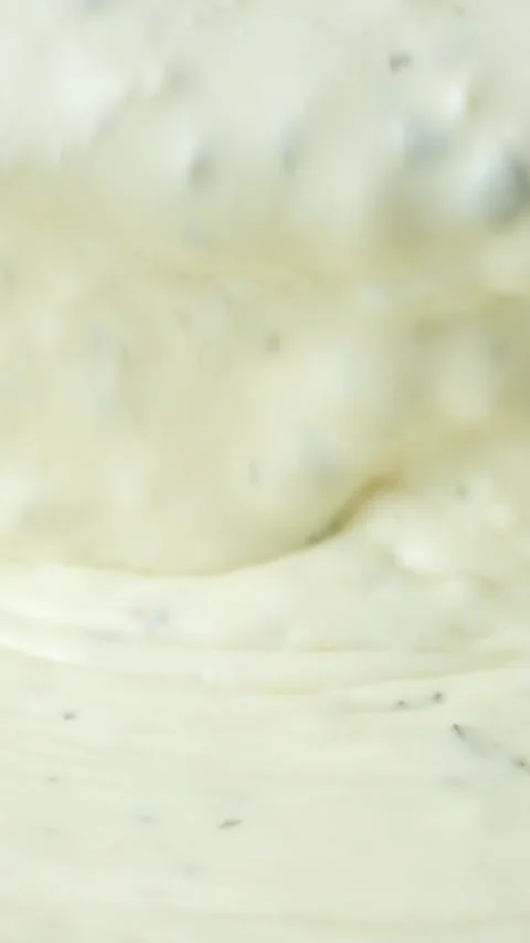 Slow motion vertical shooting of the flow of natural traditional tartar sauce Stock Footage 337701383