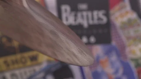 Slow motion of a vibrating drum cymbal which has been hit by a drumstick Stock Footage 231469772