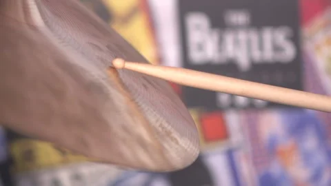 Slow motion of a vibrating drum cymbal which has been hit by a drumstick Video stock 231469795