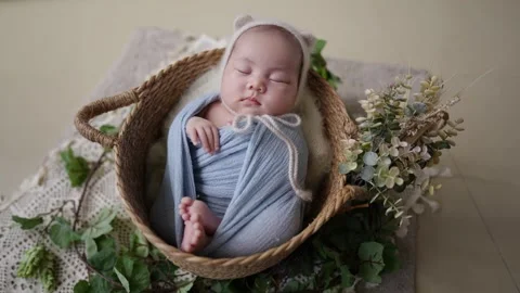 Slow-motion video of a 32-day-old Taiwanese baby's newborn photo Stock-Footage 274472022