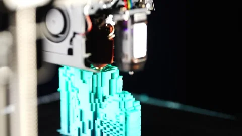 Slow motion video of a 3D printer printing a par Stock Footage 313234890