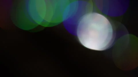 Slow motion video of abstract bokeh light with cool colors moving. 스톡 동영상 309491071