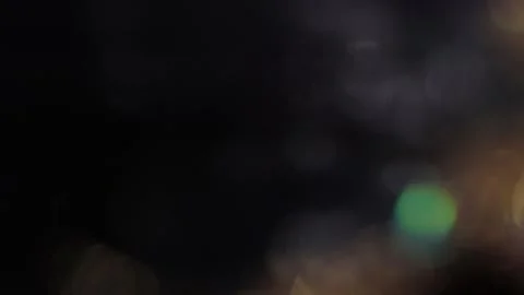 Slow motion video of abstract multicolored bokeh light glowing and blurring in t 動画素材 318366184