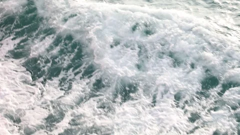 Slow motion video of aerial view of the ocean waves splashing Stock Footage 343821017
