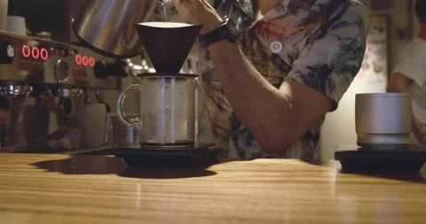 A slow motion video of a Barista making coffee Stock Footage 236596394