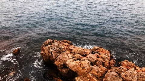 Slow motion video of big rocks in darken sea Stock Footage 87143471