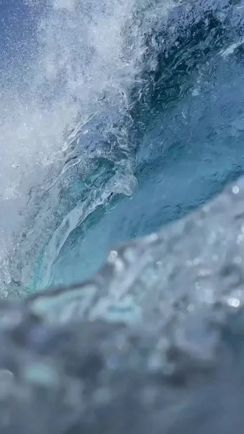 Slow motion video of blue sea wave from the water.Vertical video Stock Footage 294688024