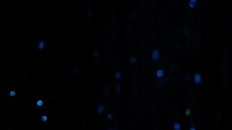 Slow motion video of Blue shining glitter particles background. Stock Footage 149587129