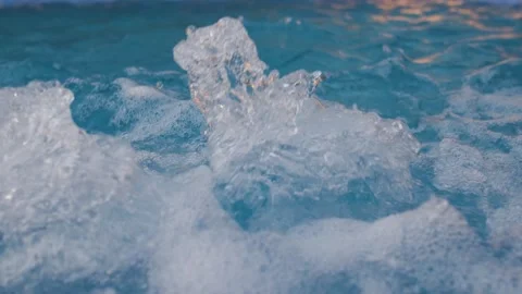 In this slow motion video, bubbles gracefully rise in a working jacuzzi. Stock Footage 262579848