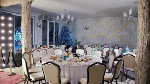 Slow motion video Christmas table decoration. Against the backdrop Stock Footage 231236606