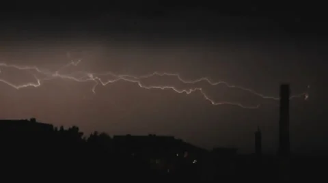 Slow motion video clip of lightning and severe thunderstorm clouds above the  Stock Footage 64658458