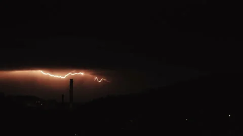 Slow motion video clip of severe thunderstorm clouds at night with lightning. Stock Footage 64658462