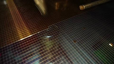 Slow motion video of Close up pick up silicon die in silicon wafer Stock Footage 152059546