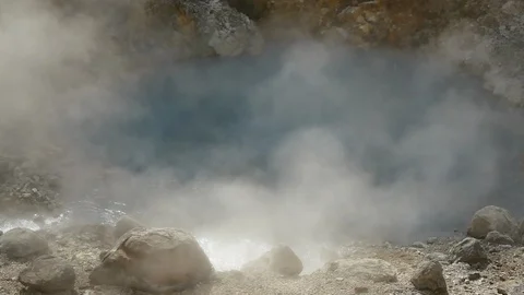 Slow Motion Video close up of smoke in Goshougake Onsen hotspring in autumn s Stock Footage 100178773
