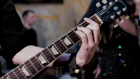 Slow motion video for electronic guitar. Guitarist plays guitar Stock Footage 231233734