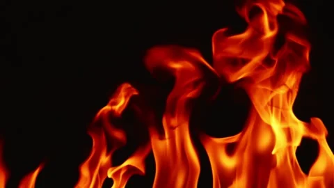 Slow motion video of fire and flames burning gas or gasoline ignited by fire. Stock Footage 240273338