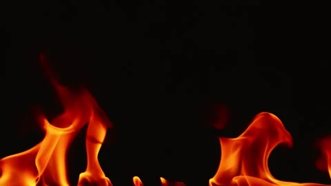 Slow motion video of fire and flames burning gas or gasoline ignited by fire. Stock Footage 240273629