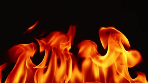 Slow motion video of fire and flames burning gas or gasoline ignited by fire. Stock Footage 240273917
