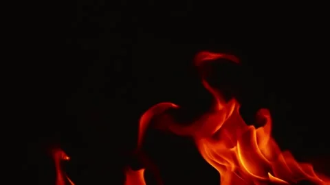 Slow motion video of fire and flames burning gas or gasoline ignited by fire. Stock Footage 240274014