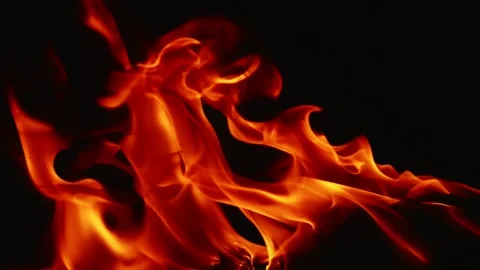 Slow motion video of fire and flames burning gas or gasoline ignited by fire. Stock Footage 240274072
