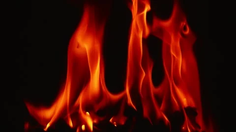 Slow motion video of fire and flames burning gas or gasoline ignited by fire. Stock Footage 240274281