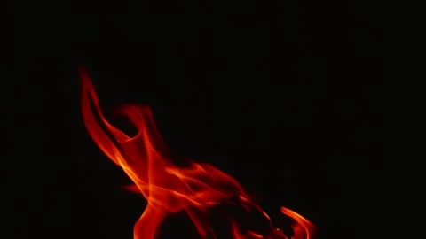 Slow motion video of fire and flames burning gas or gasoline ignited by fire and Stock Footage 240274309
