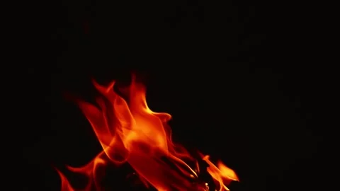 Slow motion video of fire and flames burning gas or gasoline ignited by fire and Stock Footage 240274322