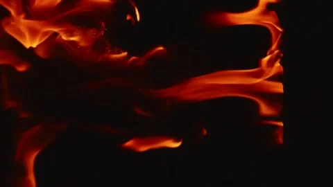 Slow motion video of fire and flames burning gas or gasoline ignited by fire and Stock Footage 240274346