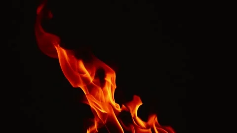 Slow motion video of fire and flames burning gas or gasoline ignited by fire and Stock Footage 240274360