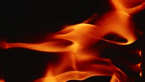 Slow motion video of fire and flames burning gas or gasoline ignited by fire and Stock Footage 240274361