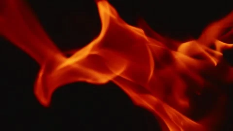 Slow motion video of fire and flames burning gas or gasoline ignited by fire and Stock Footage 240274379