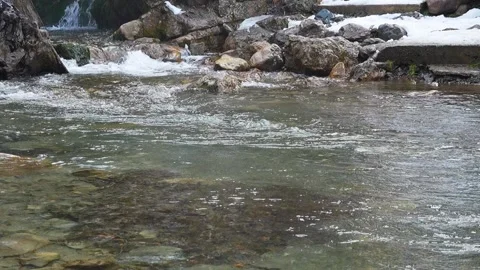Slow motion video of flow of a mountain turbulent river with clear clear wa.. Stock Footage 311826460
